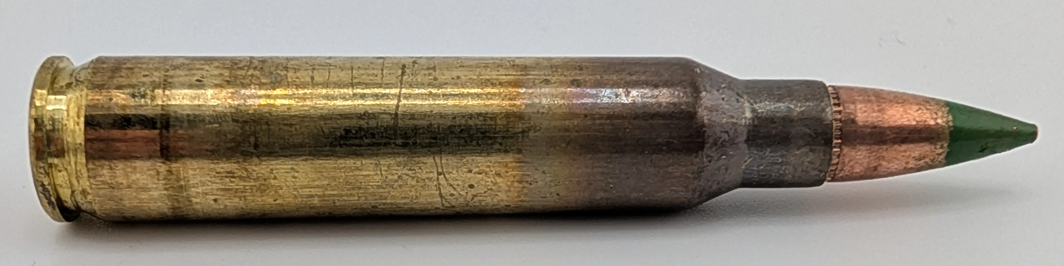 A 5.56 Lake City M855 cartridge